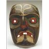 Image 1 : A Kwakiutl carved and painted wood bird mask, with pierced mouth and attached beak, 11" - 27.9 cm...