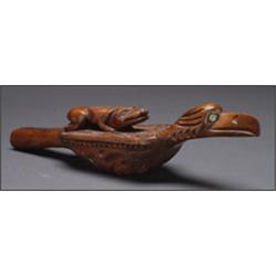A Northwest Coast carved wood ceremonial dance rattle, with inset abalone eyes, 16.5" - 41.9 cm....