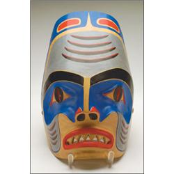 KUIYATSEECK TCHUSS MIYUH, A Northwest Coast carved and painted wood Shark portrait mask, signed...