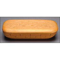 ROCKY JONES (1949 - ), A Northwest Coast wood storage box, the lid decorated with a carved Sea...