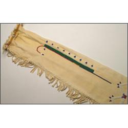 A Plains hide pipe bag, decorated with a beaded ceremonial staff and a hide fringe, 28" - 71.1 cm...