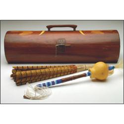 A Southwest beaded hide and feather shaman's wand and rattle, contained in a lidded wood box with...