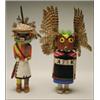 Image 1 : A HOPI POLYCHROME WOOD KACHINA DOLLS, one figure wearing a casemask decorated with feathers, toge...