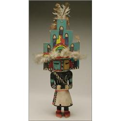 A HOPI POLYCHROME WOOD KACHINA DOLL, the figure with it's cylindrical casemask divided into recta...
