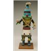 Image 1 : A HOPI POLYCHROME WOOD KACHINA DOLL, the standing figure with bent knees, a cylindrical nose and...