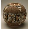 Image 1 : ACOMA POLYCHROME JAR, painted over the burnished cream slip in black with an elaborate pattern of...
