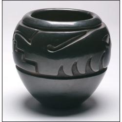 Margaret Tafoya Black Pottery Vase, the burnished globular body deeply carved with geometric de...