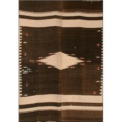 NAVAJO RUG, early 20th Century, woven in two sections, a square medallion centred by a flowerhead...