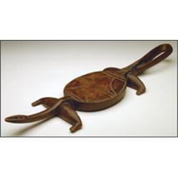 Wood Figure of a Crocodile, with ovoid body incised with dentil bands, l. 25.6" - 65 cm., Est...