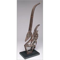 Bambara Chiwara, of female Minianka type, with a small antelope to the back of the larger, each...