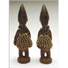 Image 1 : Pair of Yoruba Ibeji Figures, of males, each wearing a cowrie cape and a bead belt, the shoulde...