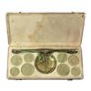 Image 1 : Set of Italian scale and coin weights, ca. 1805, in original, leather-lined wooden case.