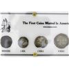 Image 1 : Four-coin denomination set in holder printed with "The First Coins Minted in America," consisting of