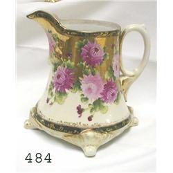 UM footed milk pitcher with rose decora