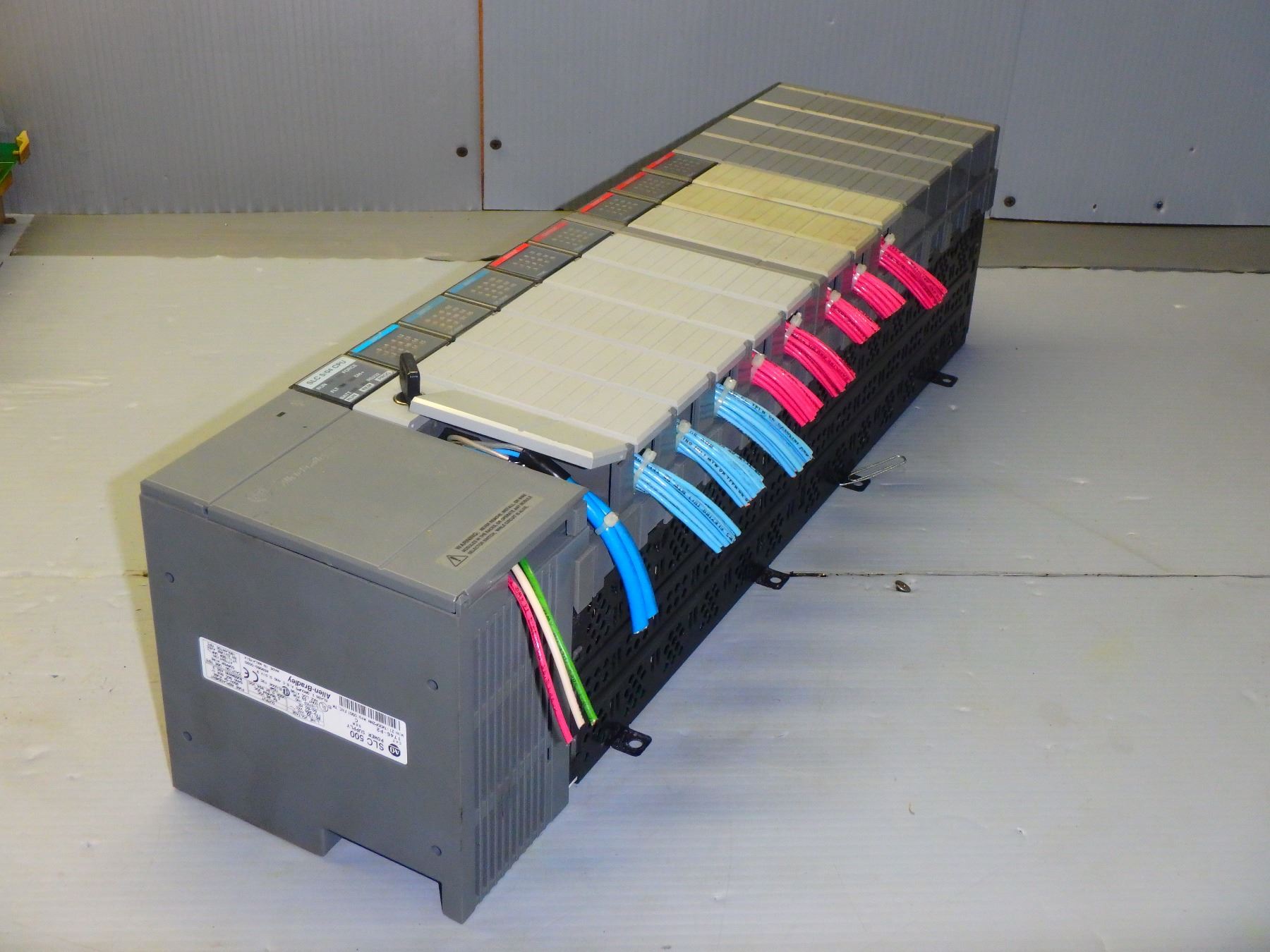 ALLEN BRADLEY 13 SLOT RACK W/ MISC. INPUT/OUTPUT MODULES SEE PICS FOR ...