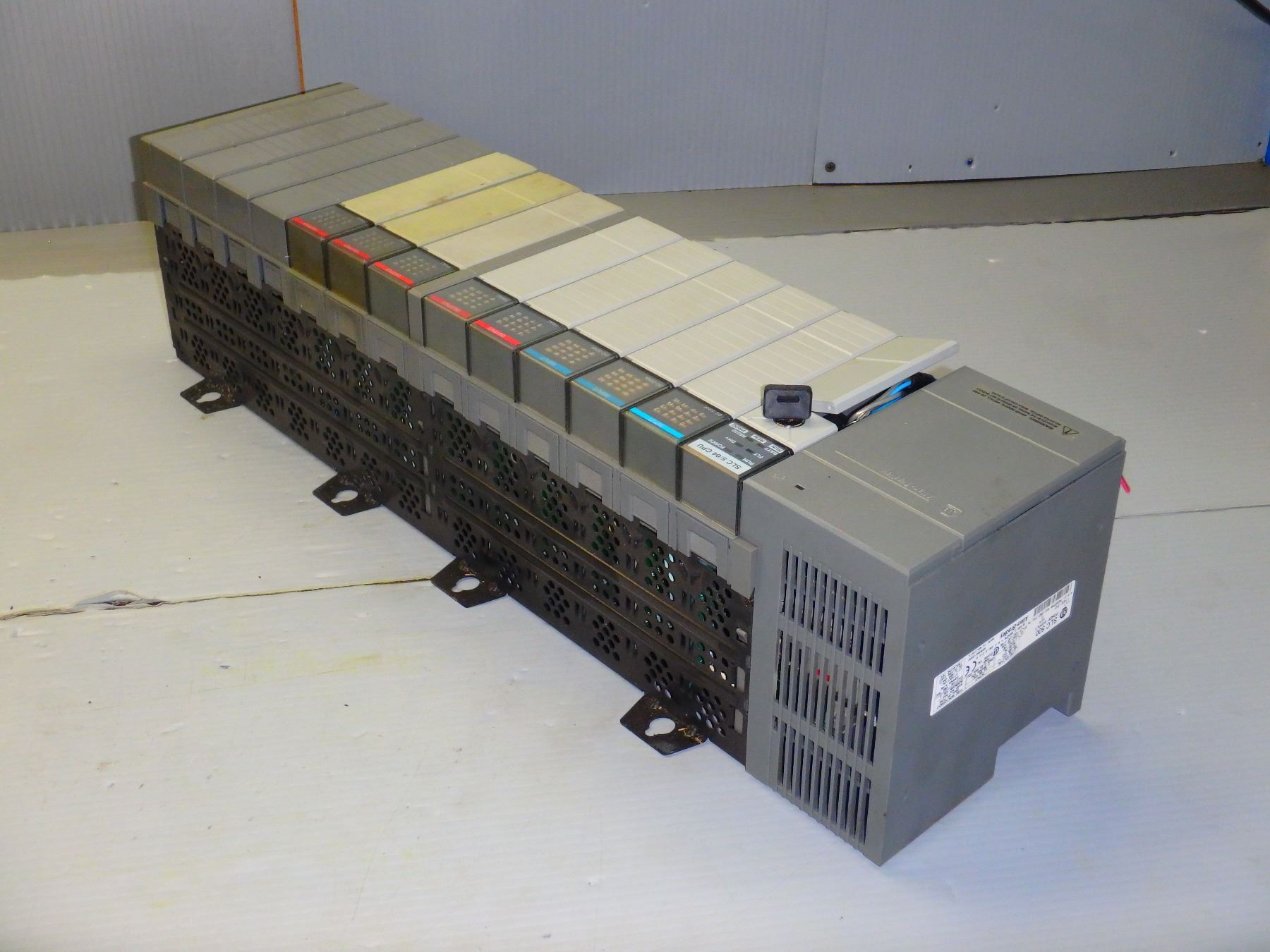 ALLEN BRADLEY 13 SLOT RACK W/ MISC. INPUT/OUTPUT MODULES SEE PICS FOR ...