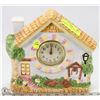 Image 1 : DECORATIVE VILLAGE MANTEL CLOCK