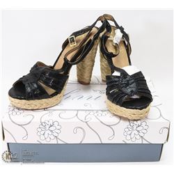 PAIR OF BLACK HIGH HEELED SANDLES SIZE 8