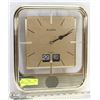 Image 1 : GOLD BULOVA QUARTZ WALL CLOCK W/ DAY &