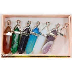 LOT OF 7 ASSORTED SEMI PRECIOUS PENDANTS.