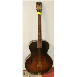 VINTAGE GUITAR STAMPED MADE IN NEW YORK.