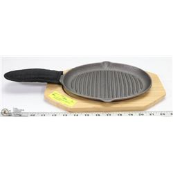 3 PC CAST IRON OVAL GRIDDLE WITH WOODEN