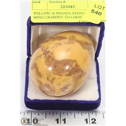 YELLOW & BROWN STONE CARVED AND POLISHED TO LOOK