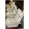 Image 1 : LOT OF 4 PADDED FLORAL PATIO CHAIRS.
