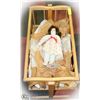 Image 1 : WOOD CRADLE WITH PORCELAIN DOLL.