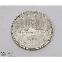 1983 CANADIAN $1.00 COIN.