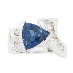 18KT White Gold Blue Topaz and Diamond Ring