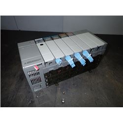 ALLEN BRADLEY 1746-A7 7-SLOT RACK W/ 5 MODULES