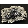 Image 1 : Cassiterite and Muscovite from China
