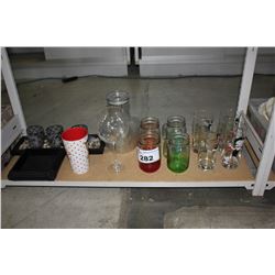 SHELF OF GLASSWARE INCLUDING VASE, CANDLE HOLDER, AND CUPS