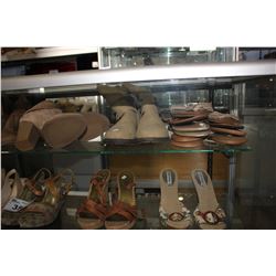 SHELF OF HIGH HEELS, SANDALS, BOOTS, FLIP-FLOPS, AND MORE