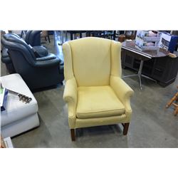 TAN UPHOLSTERED WINGBACK CHAIR