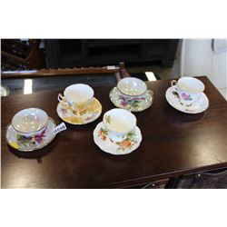 FIVE CHINA CUPS AND SAUCERS