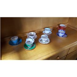 SEVEN BONE CHINA CUPS AND SAUCERS