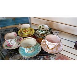 CHINA CUPS AND SAUCERS ON TRAY