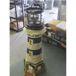 24" Solar Lighthouse / Blue  small chip at bottom , will be in the dirt anyway