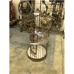 DISTRESSED METAL CAGE WITH HANGING BABY