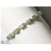 Image 2 : 38) STERLING SILVER EMERALD TENNIS BRACELET