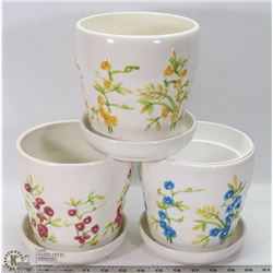 GROUP OF 3 CERAMIC FLOWER DESIGN PLANTING POTS