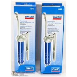 FLAT WITH 2 LINCOLN LEVER ACTION GREASE GUNS