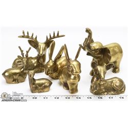 A BOX WITH 7 SOLID BRASS FIGURINES 3” - 6” TALL