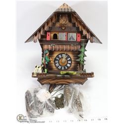 VINTAGE HEAVILY CARVED GERMAN CUCKOO CLOCK