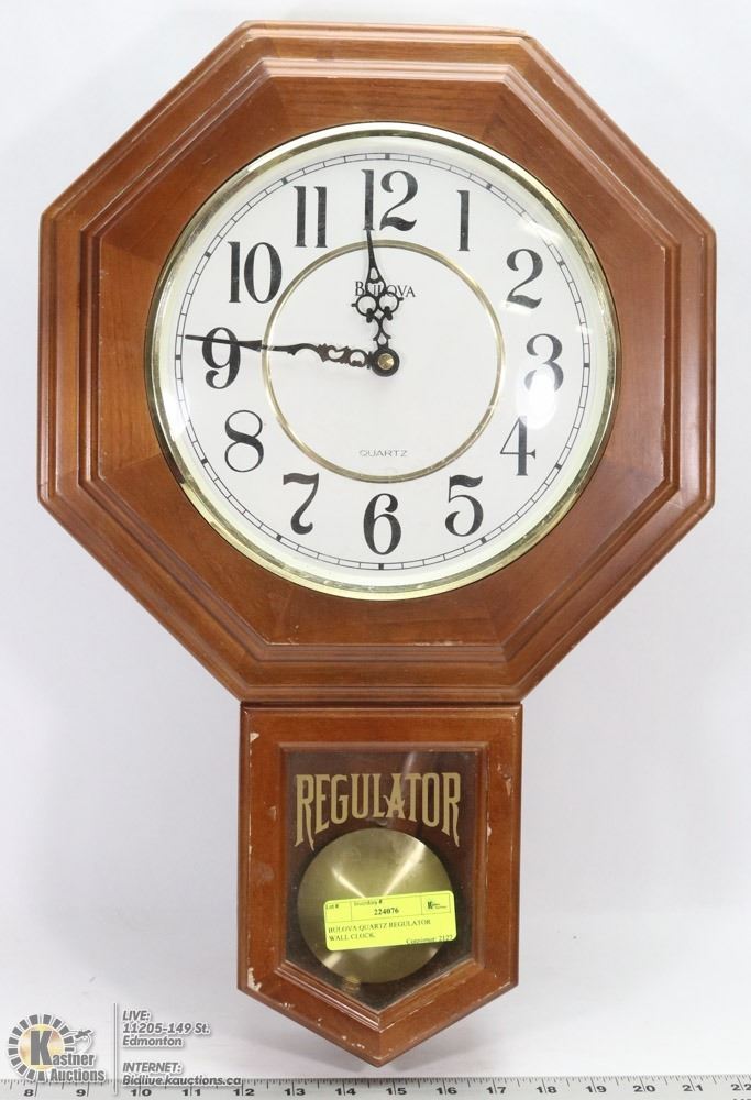 BULOVA QUARTZ REGULATOR WALL CLOCK.