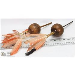 PAIR OF COLUMBIA FLAMINGO FEATHER RATTLES