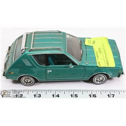 GREEN 1974 GREMLIN CAR DIE CAST.