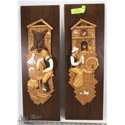 A PAIR OF PIONEER SCENE CHALKWARE WALL DISPLAYS